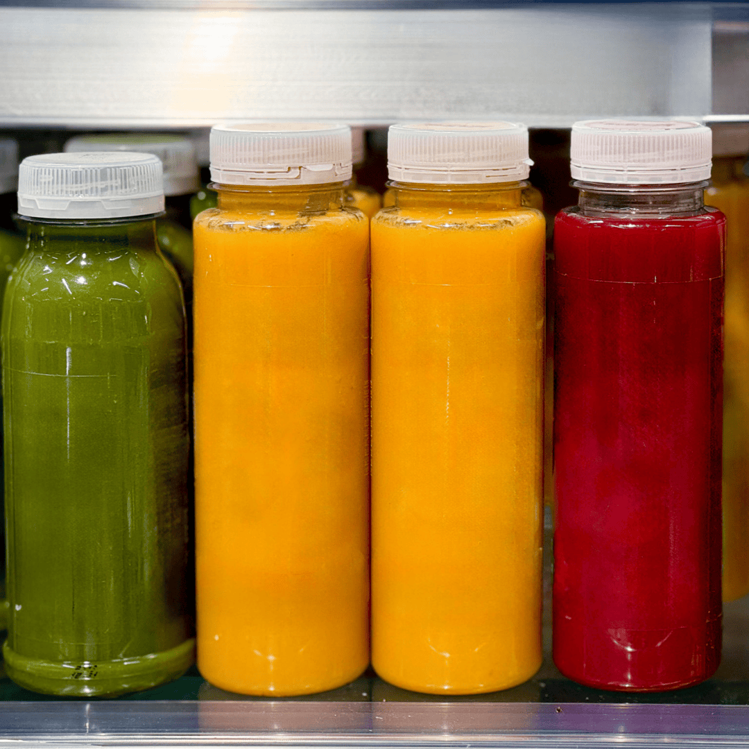 Assorted bottled juices on display.