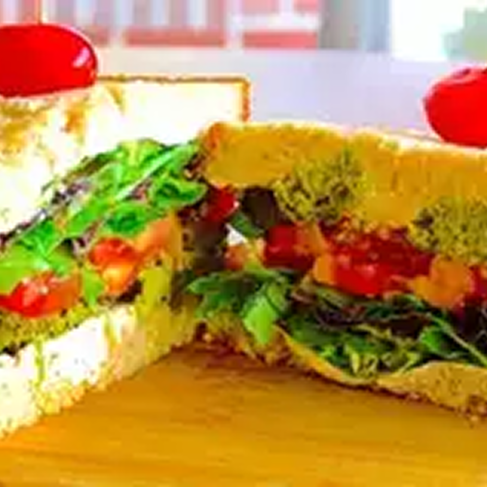 Fresh veggie-filled sandwich on bread