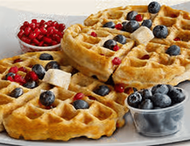 Waffles with blueberries and pomegranate