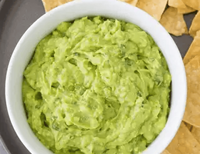 Fresh avocado dip with crunchy chips