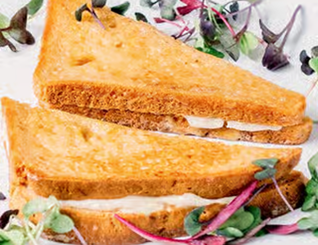 Grilled cheese sandwich and greens