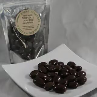 Bag of organic chocolate almonds displayed