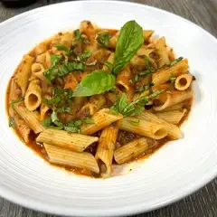 Pasta with tomato sauce and basil